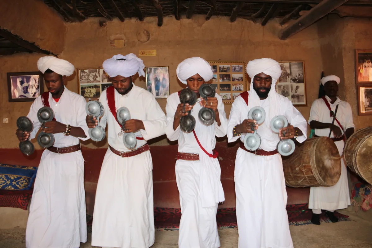 Gnawa musicians performing at Khamlia near Merzouga